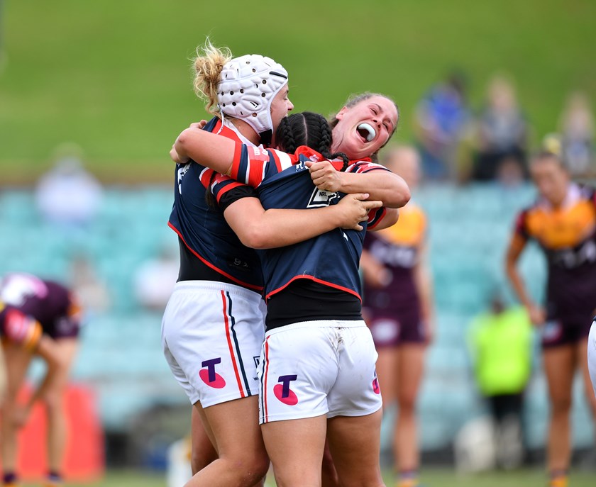 Hannah Southwell, Raecene McGregor and Tayla Predebon celebrate the Roosters semi-final defeat of Brisbane in 2021.